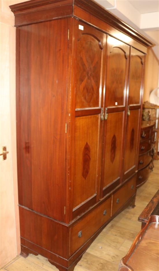 A 1920s inlaid mahogany triple wardrobe, H.211cm